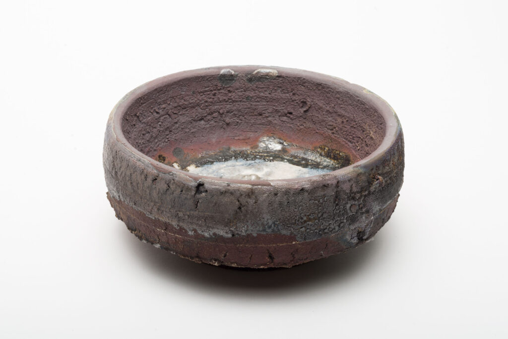 A Raku ware bowl by Nick De Pirro